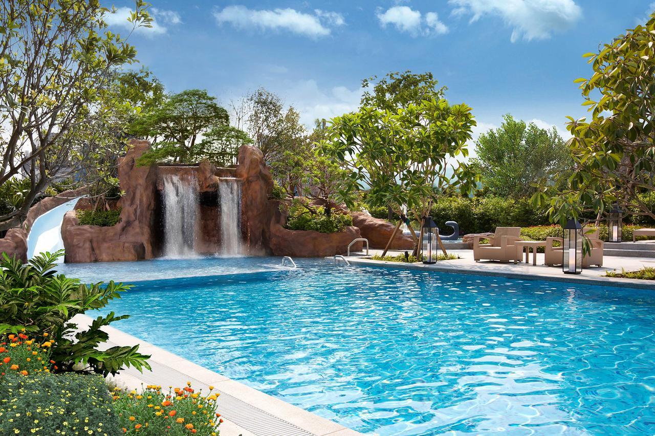 Mu Jiaoxi Hotel Exterior foto The swimming pool at the resort